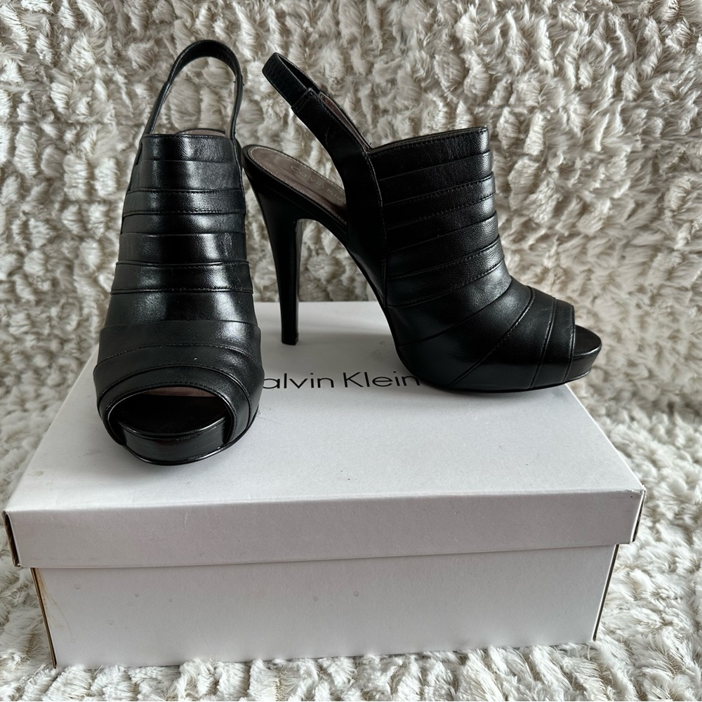 Calvin Klein- Kaylor Peeptoe Sling Back. 3/4" platform. Heel is 4.25"